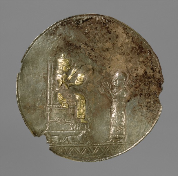 Armenian Medallion with a seated deity and a male worshiper, Iron Age ca. 8th–7th century B.C. Urartu (Ararat) period. Silver, gold foil - Gift of Norbert Schimmel Trust, 1989