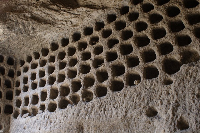 Rows of pigeon holes of a dovecote inside a rectangular chamber in the Igadzor valley cave-complex.